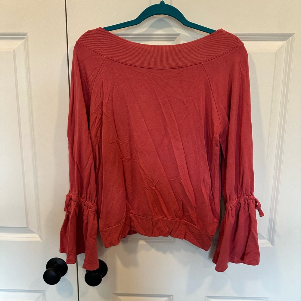 Rose pink off the shoulder sweater with tie bell sleeves from Express